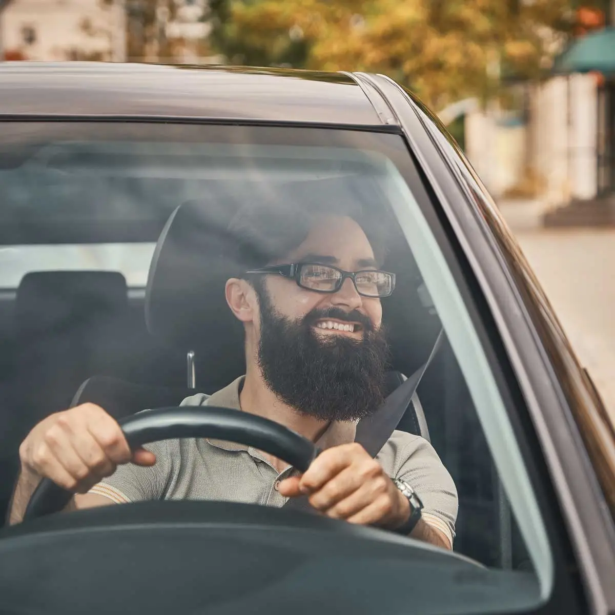 Smiling driver in a car